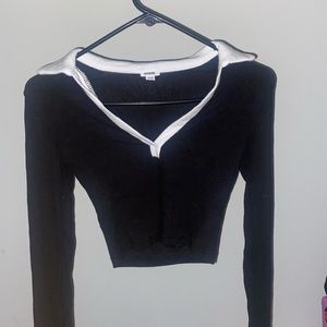 Size XS. Black/White V neck long sleeve from Garage